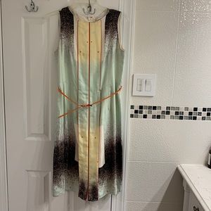 Carolina Herrera beautiful dress with bright orange belt like new.